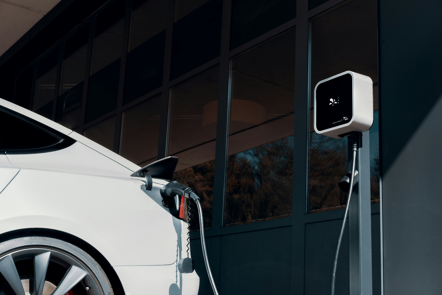Touchstone Electric technician installing an EV charger