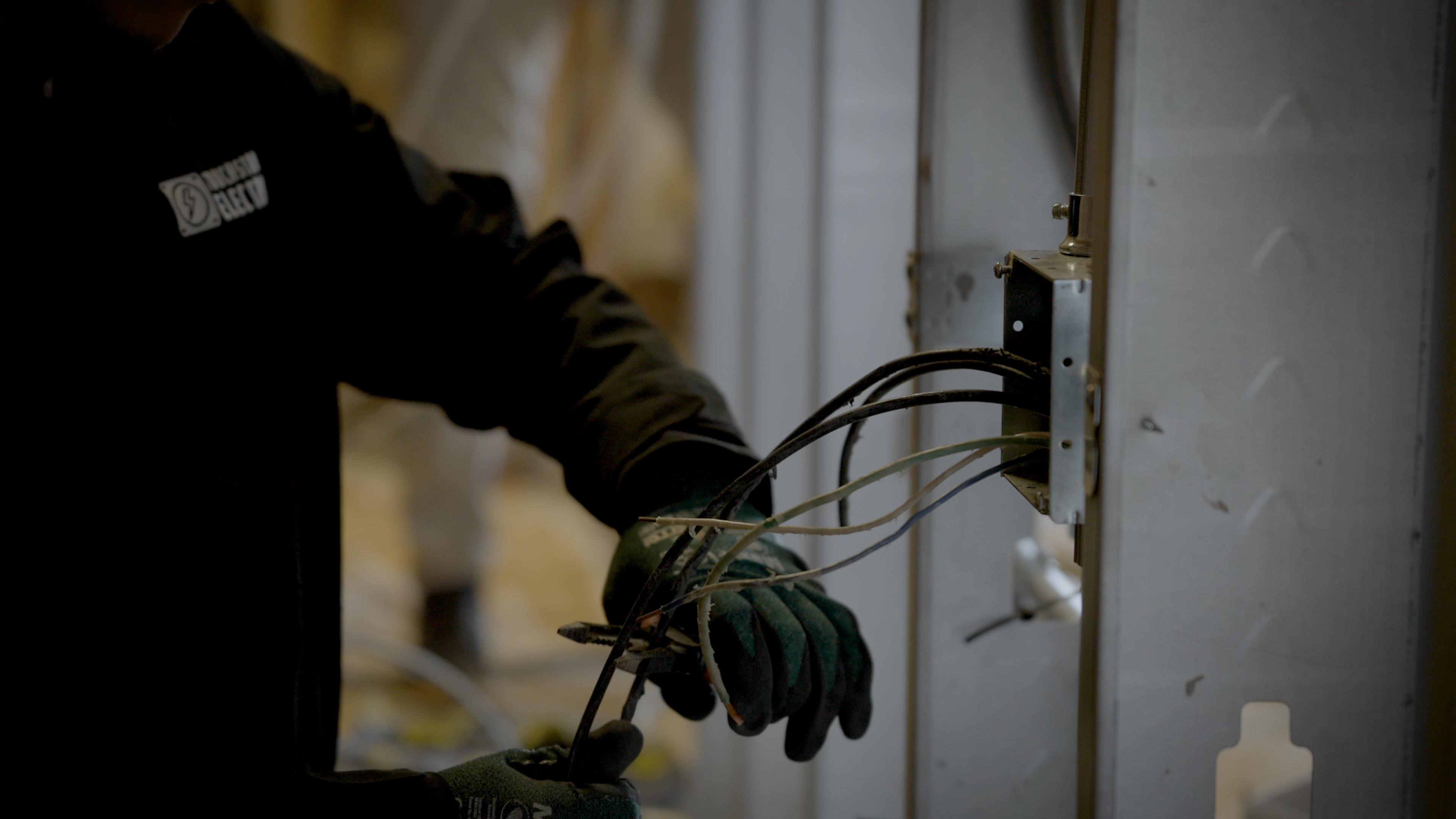 Touchstone Electric electrician focused on wire installation for a Dentsville project