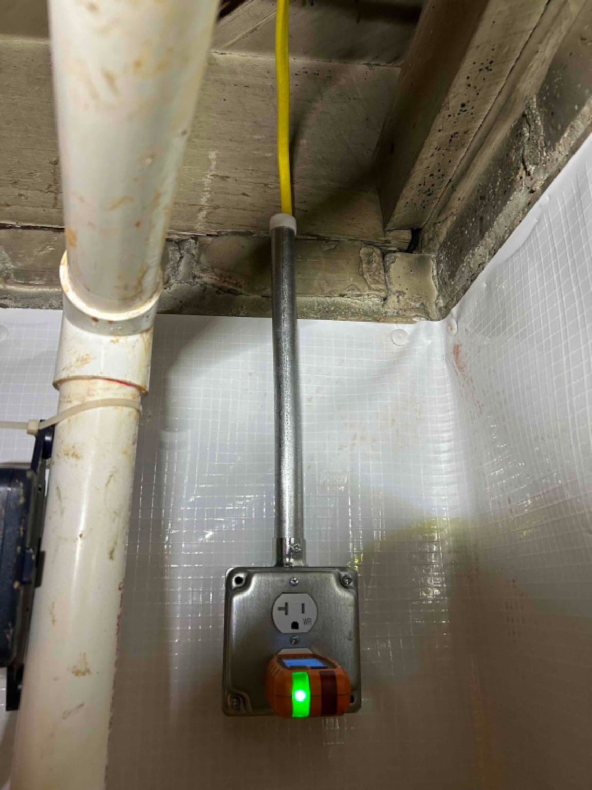 Outlet installation for basement moisture-control equipment